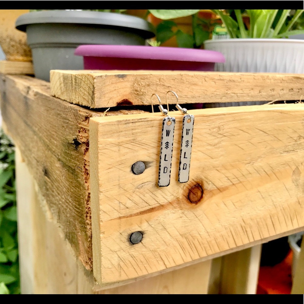 Hand stamped metal bar “WILD” earrings